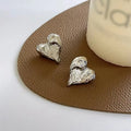 Retro Uneven Metal Heart Stud Earrings for Women